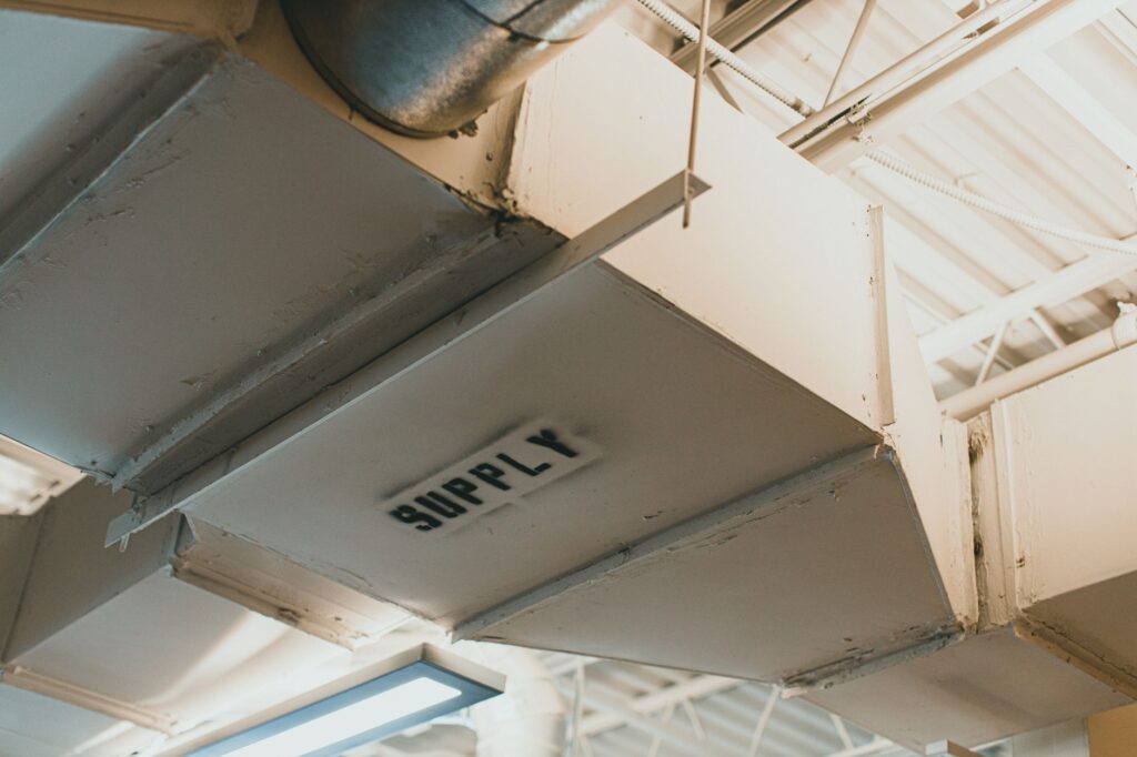 Close-up of an apartment building air duct before an air duct cleaning service