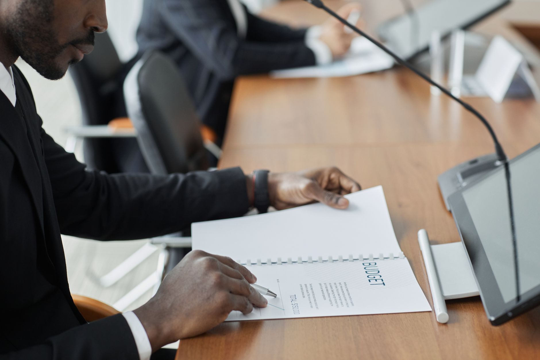 Property manager reviewing a property maintenance cost budget and proposal